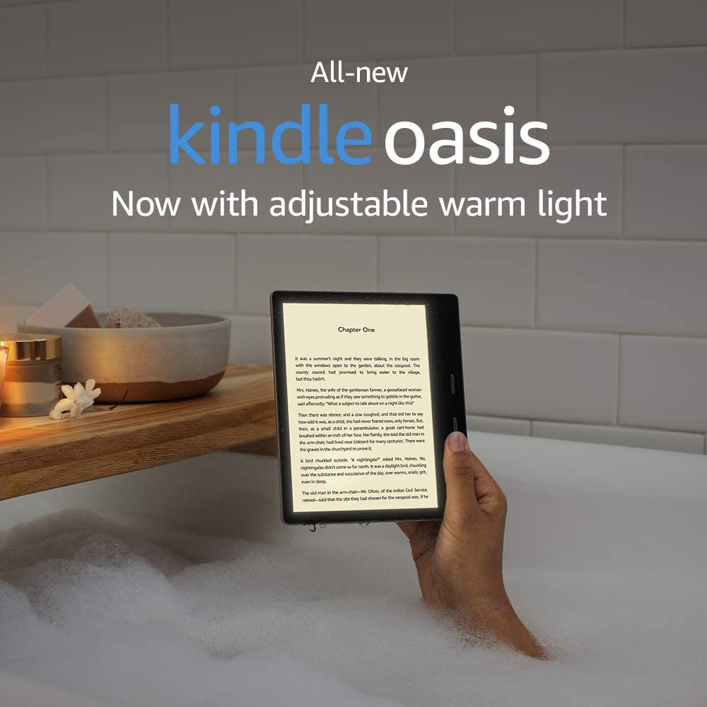 Image of Kindle Oasis help by hand of a woman in a bath tub. 